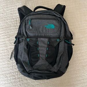 The North Face Black and Gray Backpack with Teal Accents